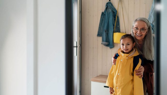 grandmother-helping-granddaughter-to-get-ready-to-2024-10-18-09-30-58-utc